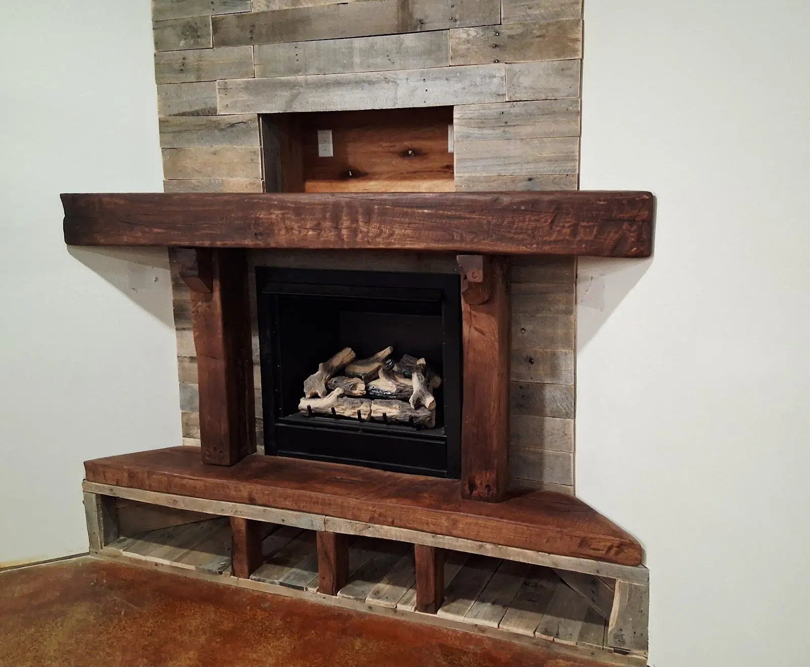 Mantel specially shaped to fit a room corner